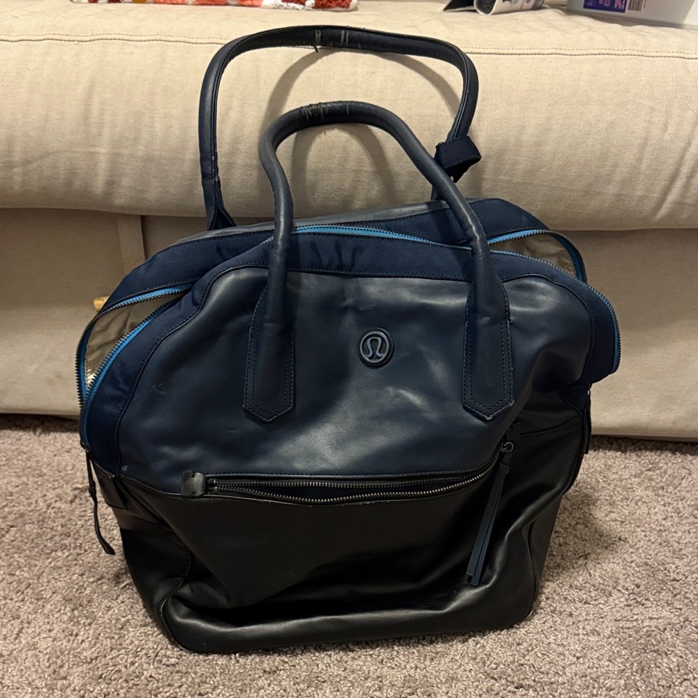 Lululemon Happy Hatha Hour Bag – Navy & Black Leather as seen on Kyrsten Sinema